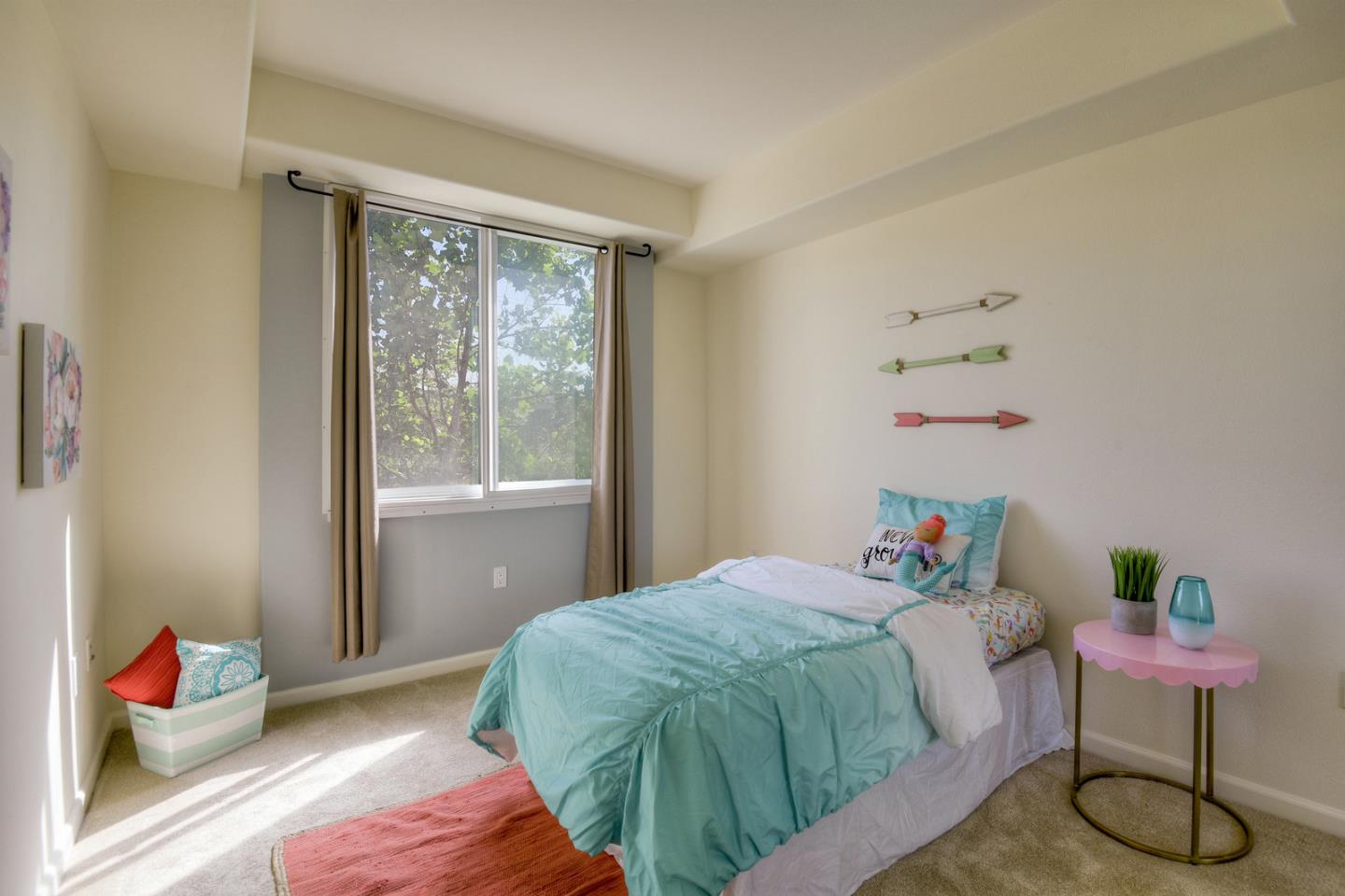 1101 South Main Street, Unit 316 Milpitas, CA 95035 - Photo 13 of 30 a bedroom with a bed and a window