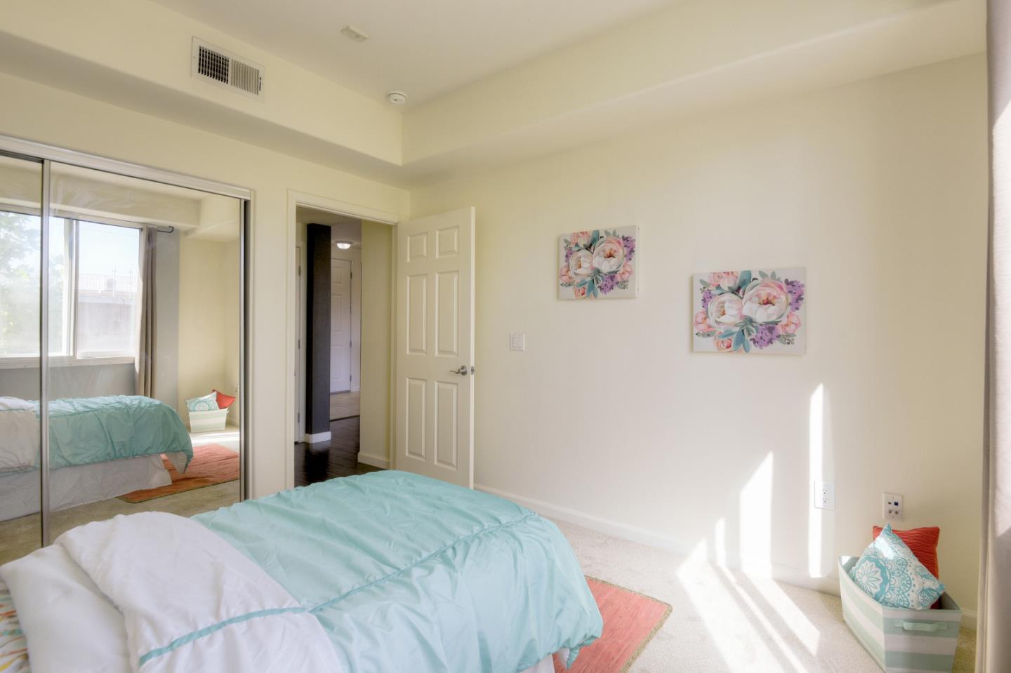 1101 South Main Street, Unit 316 Milpitas, CA 95035 - Photo 16 of 30 a bedroom with a bed and a window