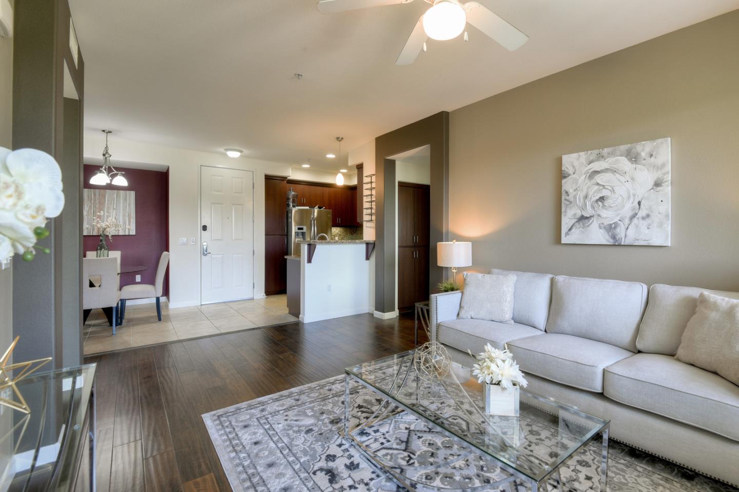 1101 South Main Street, Unit 316 Milpitas, CA 95035 - Photo 3 of 30 a living room with furniture and a couch