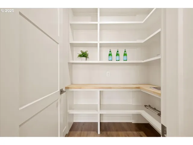 a kitchen with stainless steel appliances granite countertop a sink and stove