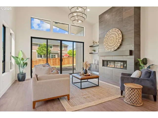 a living room with furniture and a table