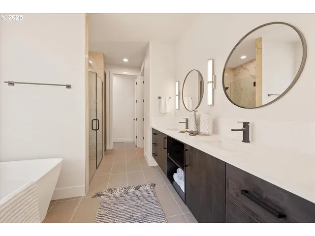a bathroom with a bathtub and a sink