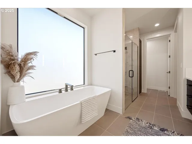 a bathroom with a shower and a toilet