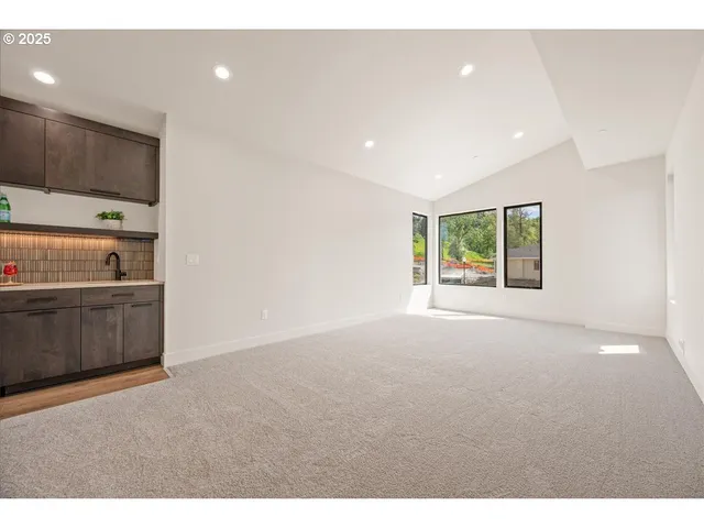a view of a kitchen with a sink