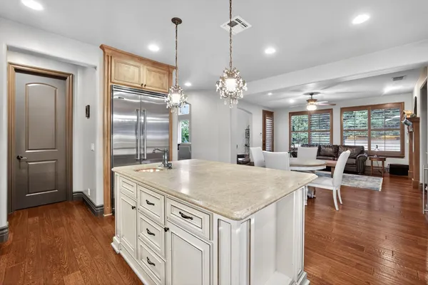a view of a kitchen and dining room