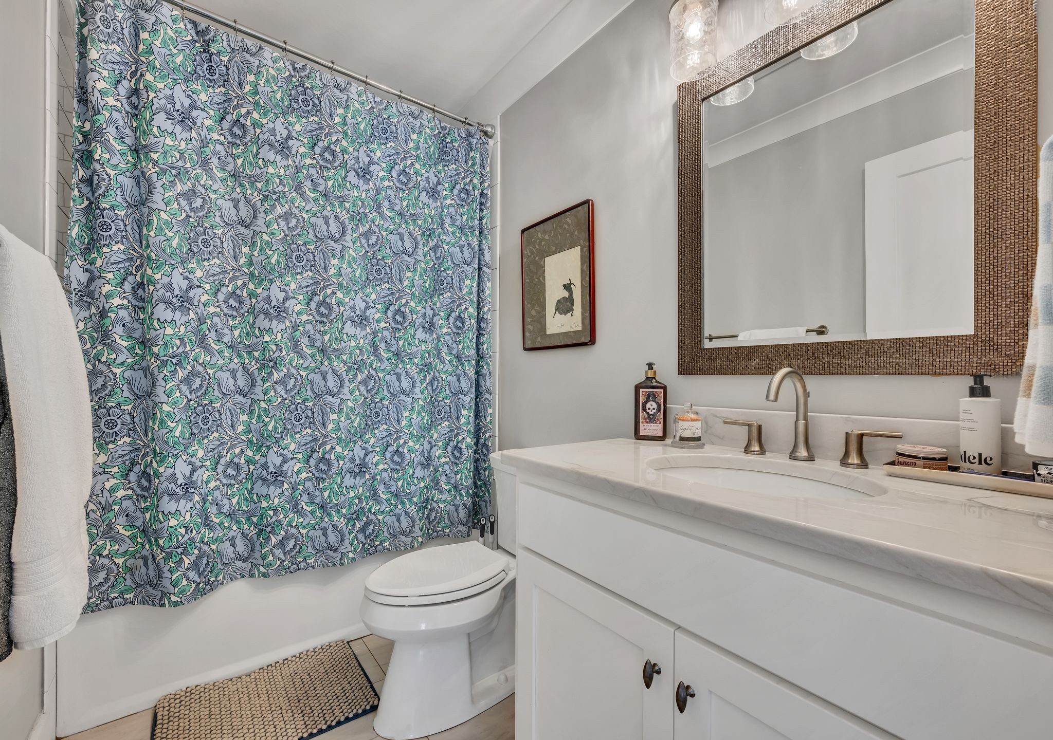 712 State Highway 48 Dickson, TN 37055 - Photo 46 of 73 a bathroom with a granite countertop toilet sink mirror and shower
