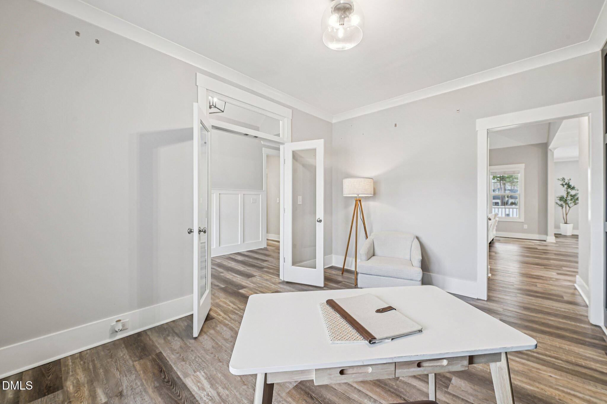 55 Dolores Court Willow Spring, NC 27592 - Photo 18 of 64 a view of a workspace with furniture and wooden floor