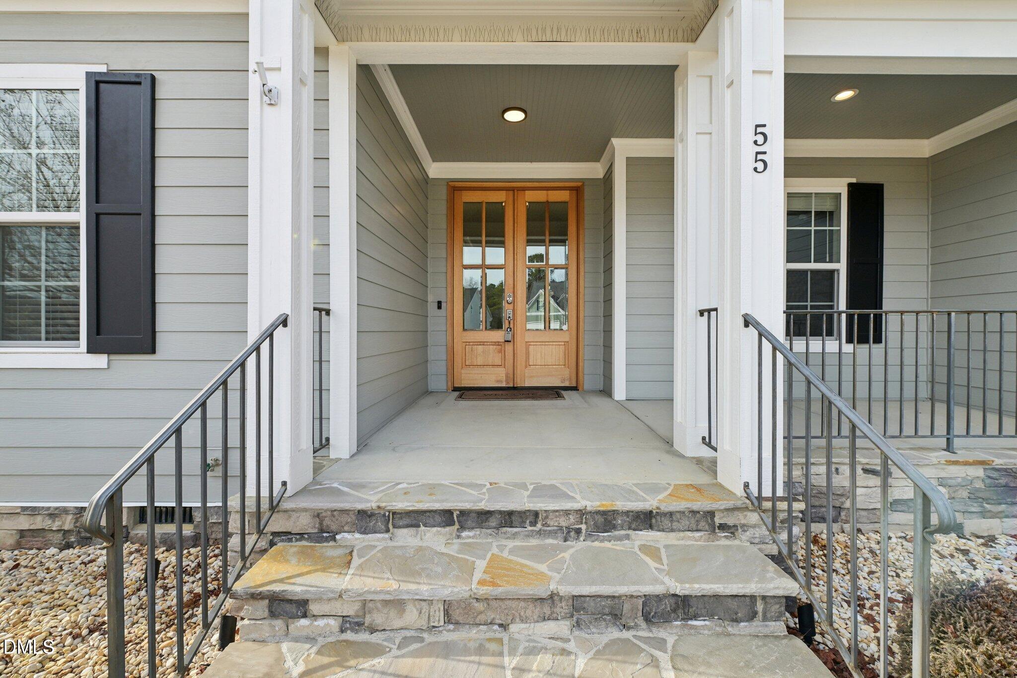 55 Dolores Court Willow Spring, NC 27592 - Photo 2 of 64 a view of a entryway door of the house