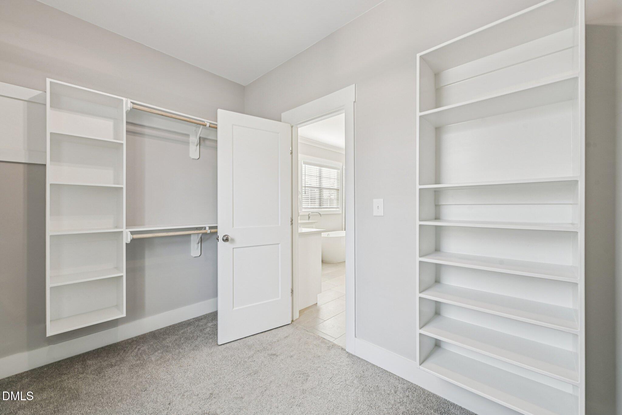 55 Dolores Court Willow Spring, NC 27592 - Photo 32 of 64 a view of an empty walk in closet
