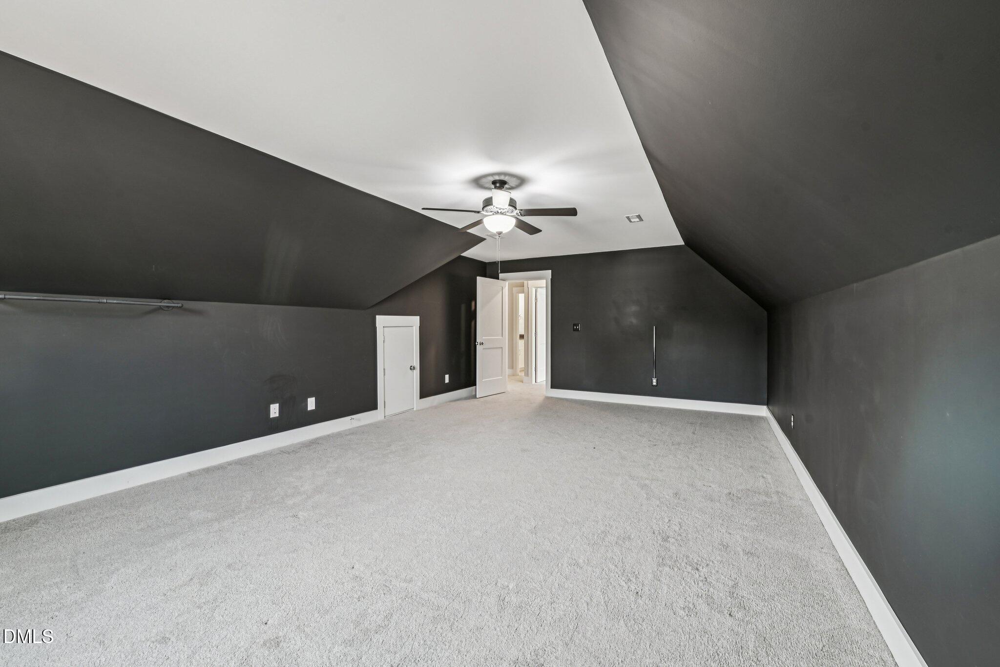 55 Dolores Court Willow Spring, NC 27592 - Photo 36 of 64 a view of a livingroom with a ceiling fan and window