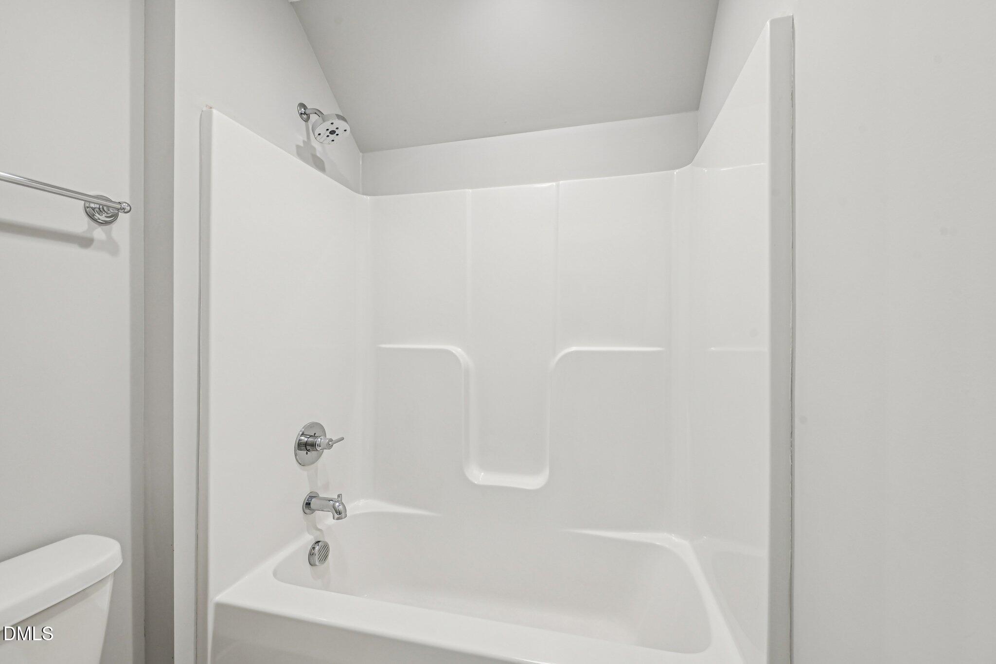 55 Dolores Court Willow Spring, NC 27592 - Photo 40 of 64 a close up of a bathtub