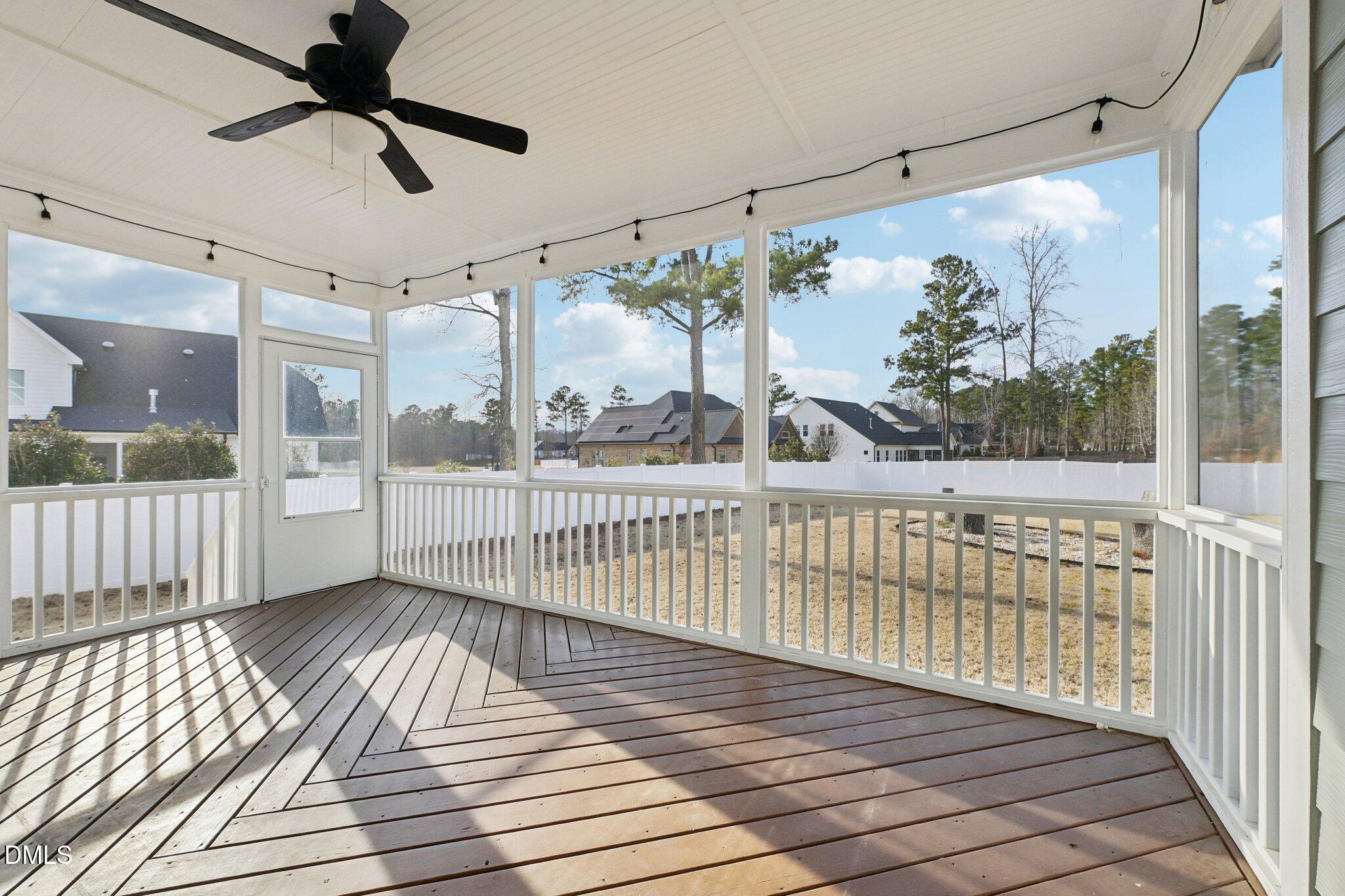 55 Dolores Court Willow Spring, NC 27592 - Photo 41 of 64 a view of a balcony with wooden floor