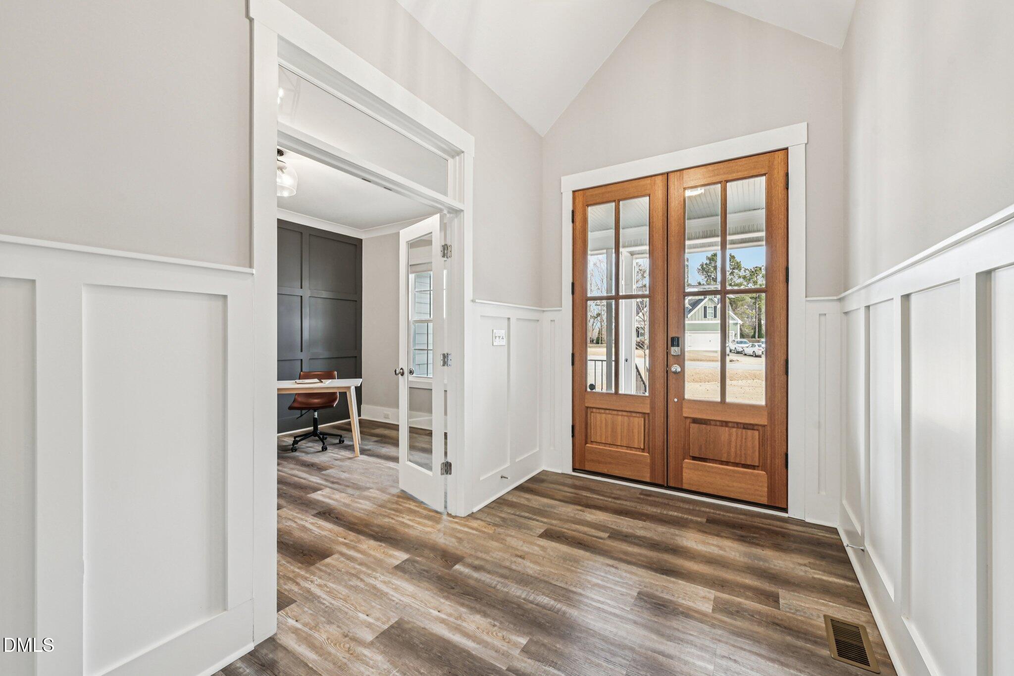55 Dolores Court Willow Spring, NC 27592 - Photo 3 of 64 an empty room with windows and closet