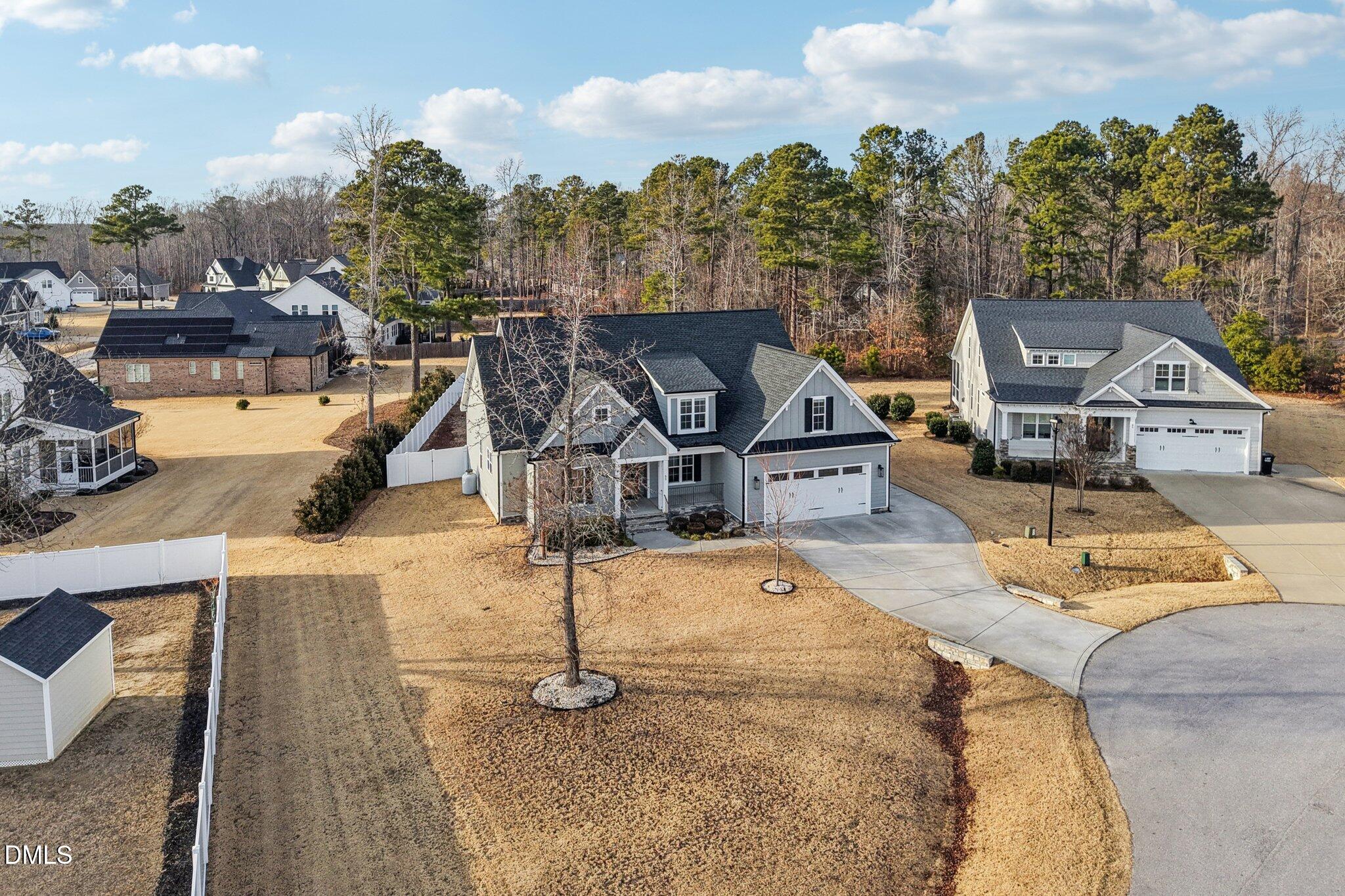 55 Dolores Court Willow Spring, NC 27592 - Photo 50 of 64 a view of a house with outdoor space