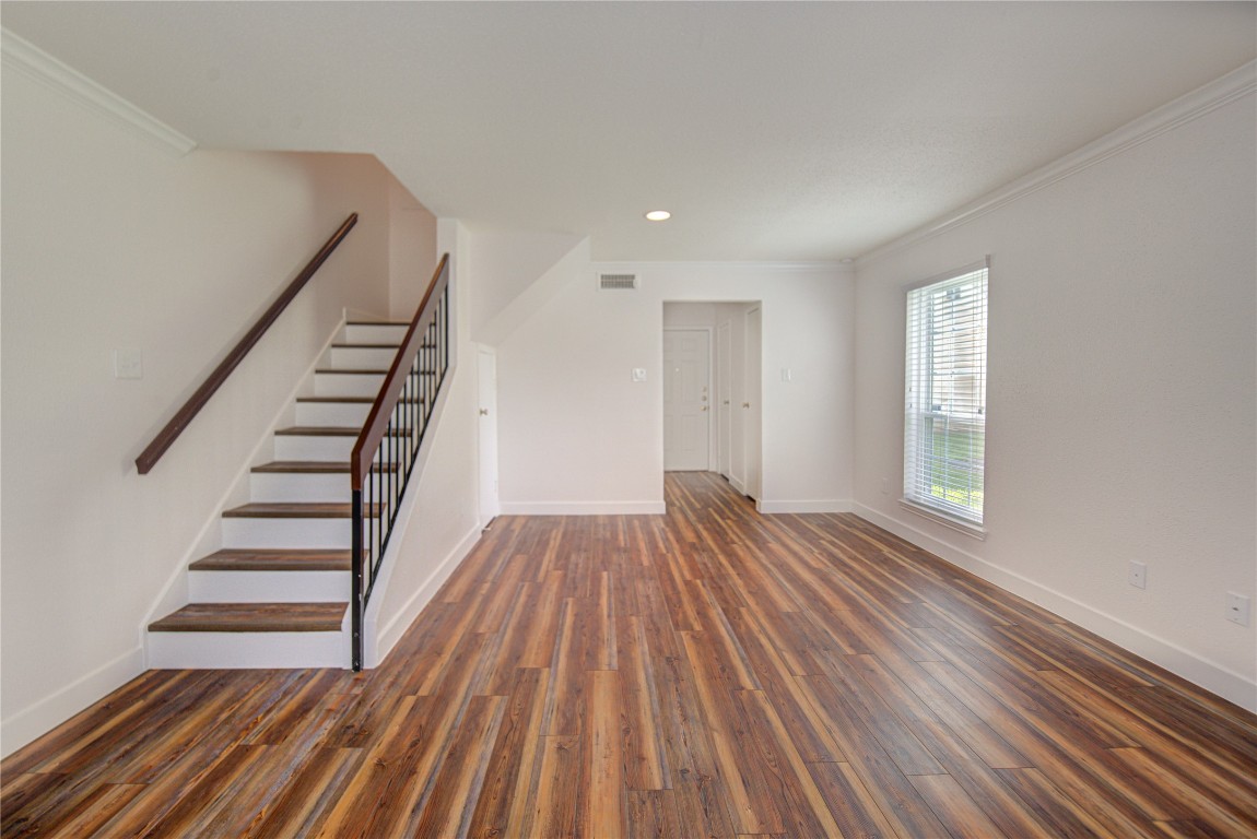 2002 Gentryside Drive, Unit 117 Houston, TX 77077 - Photo 15 of 31 a view of a room with wooden floor and entryway