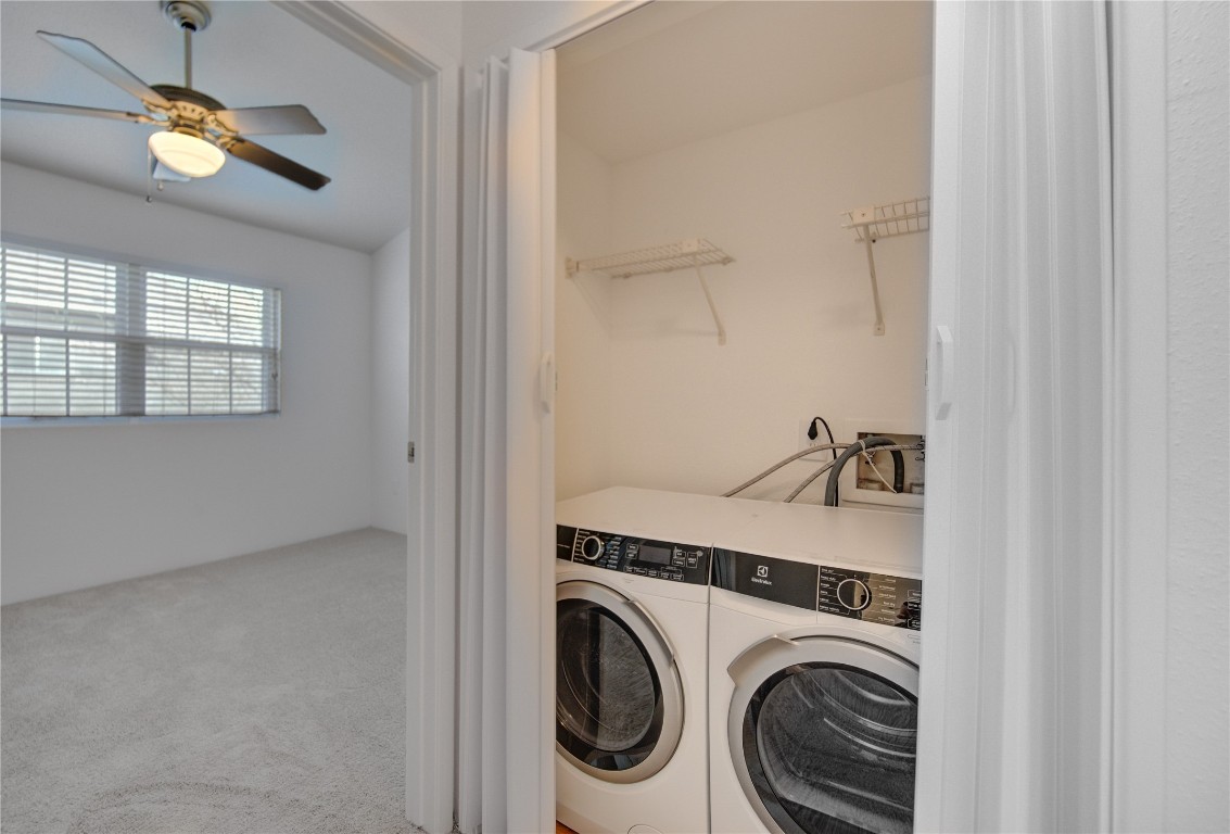 2002 Gentryside Drive, Unit 117 Houston, TX 77077 - Photo 20 of 31 a view of a hallway with washer and dryer