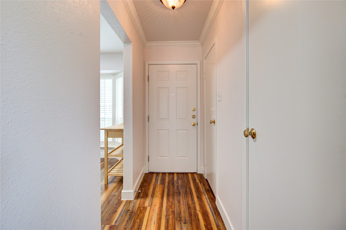 2002 Gentryside Drive, Unit 117 Houston, TX 77077 - Photo 2 of 31 a view of a room with wooden floor and a bathroom