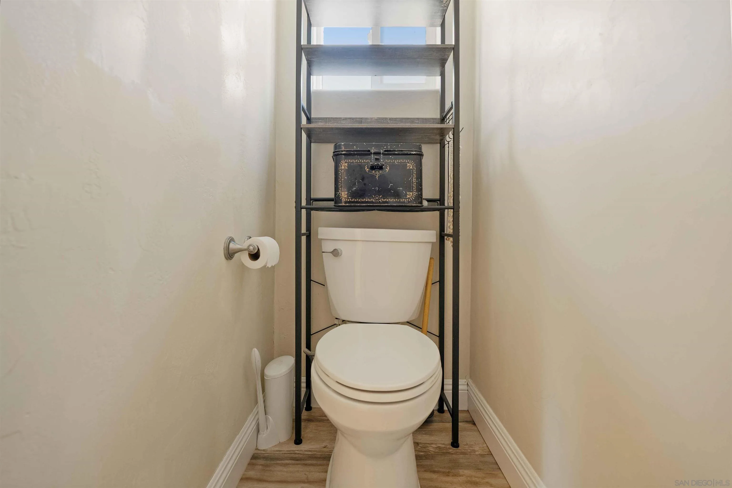 4516 Olive Avenue La Mesa, CA 91942 - Photo 24 of 48 a bathroom with a toilet and a sink
