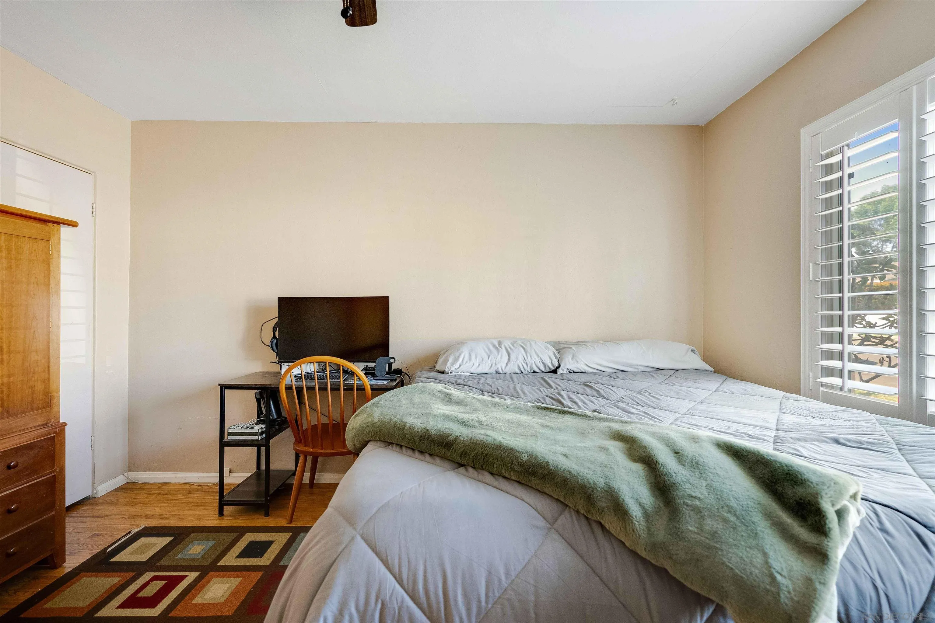 4516 Olive Avenue La Mesa, CA 91942 - Photo 28 of 48 a bedroom with a bed and a window