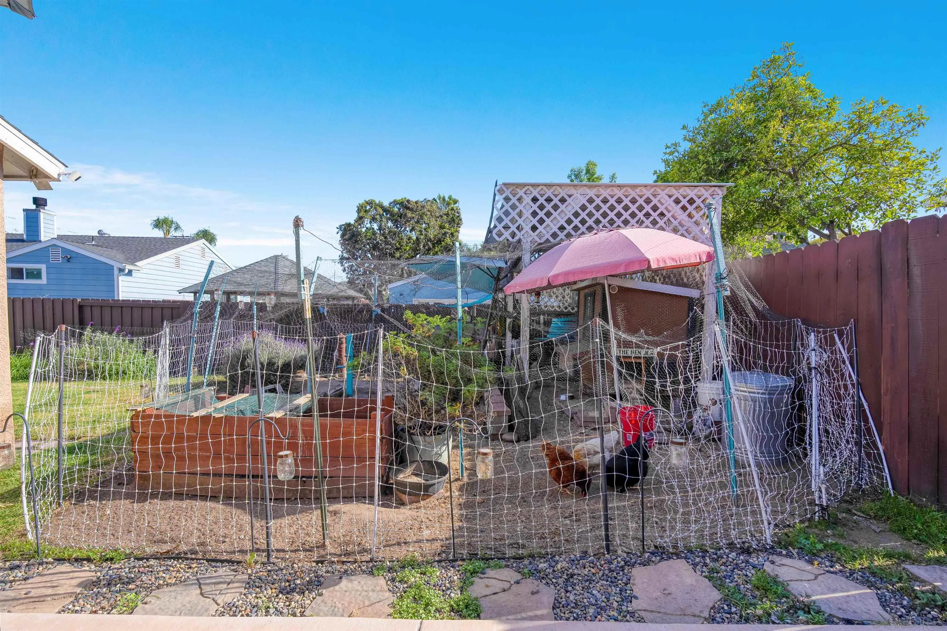 4516 Olive Avenue La Mesa, CA 91942 - Photo 44 of 48 a view of a chairs and table in backyard