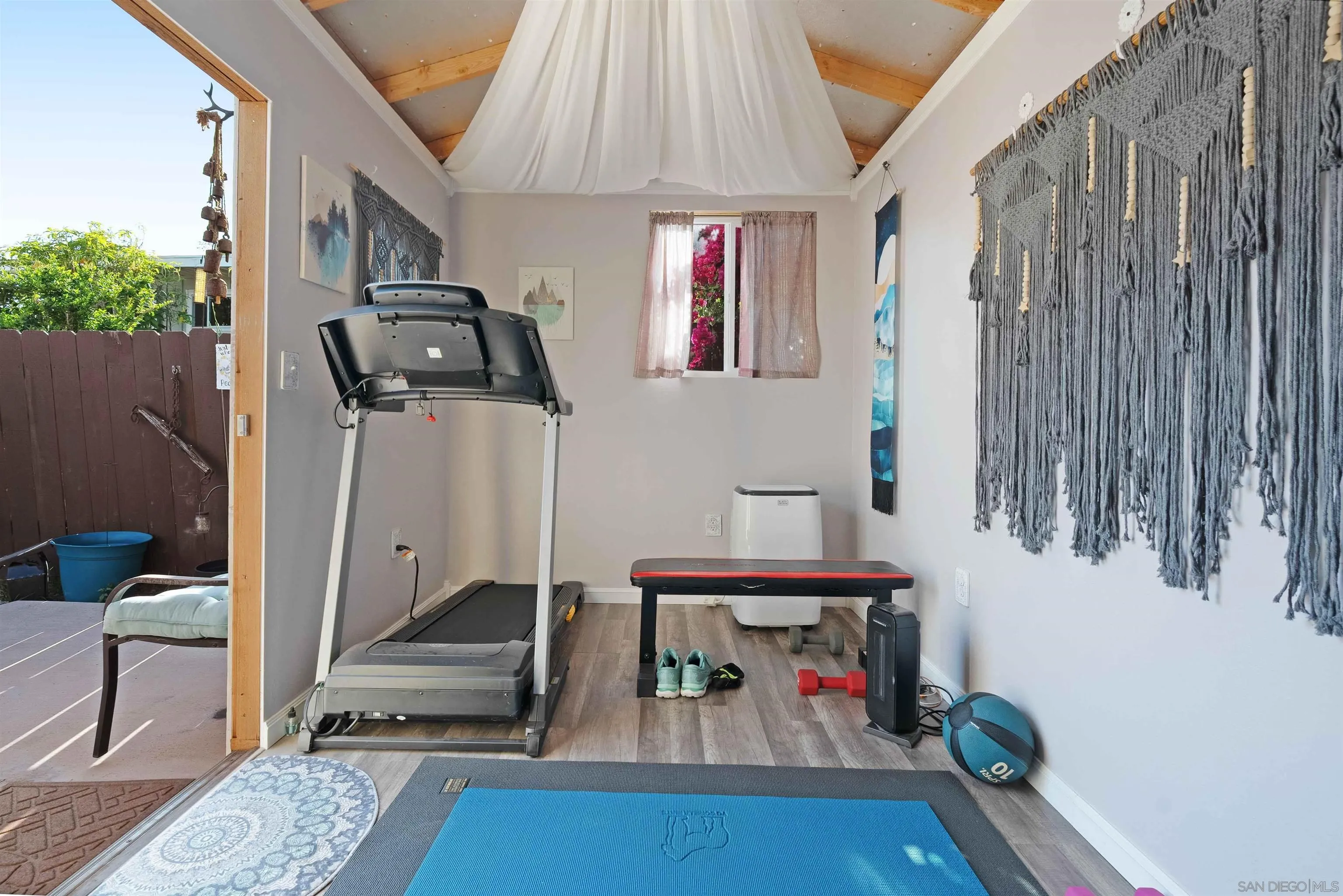 4516 Olive Avenue La Mesa, CA 91942 - Photo 45 of 48 a living room with furniture and a potted plant