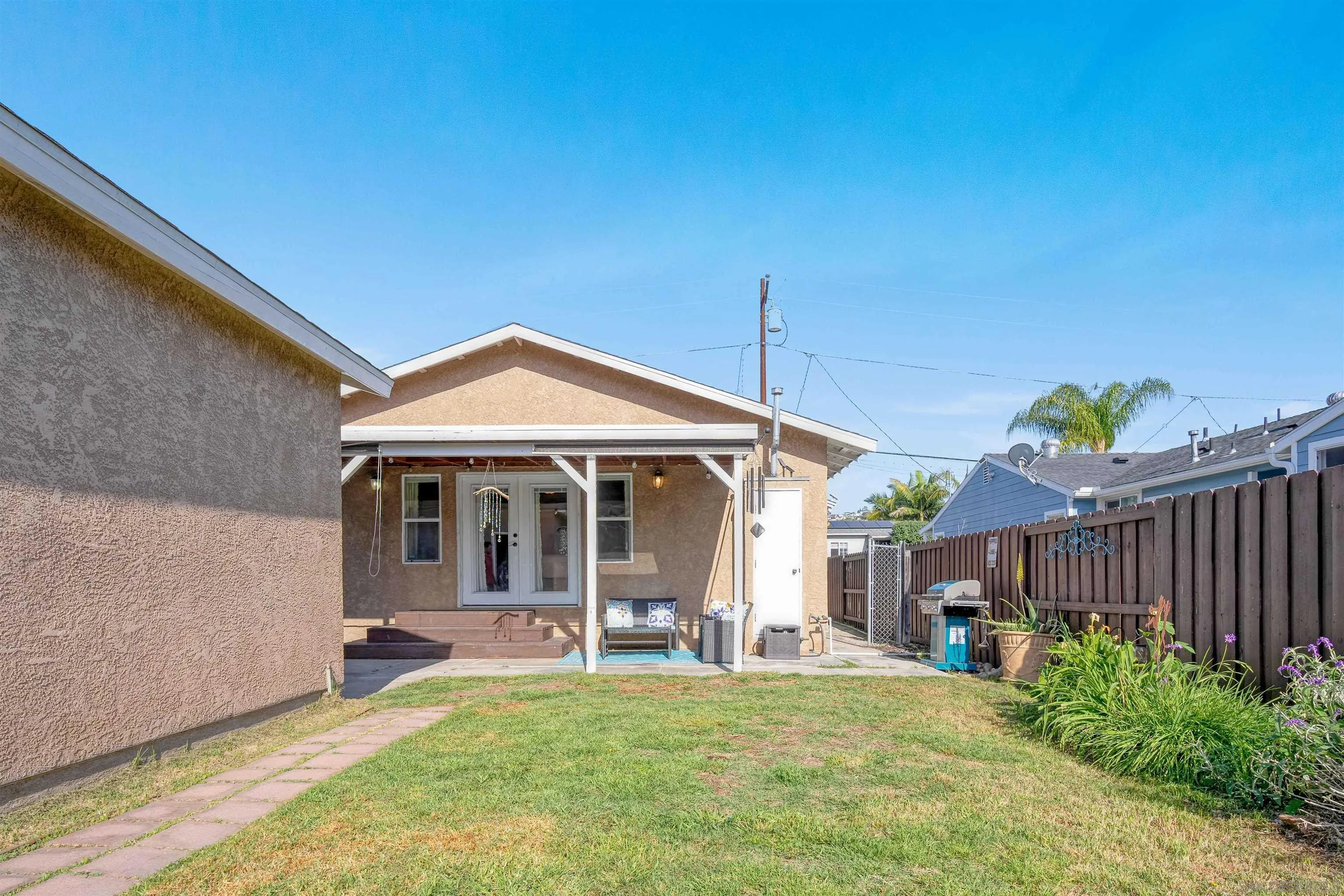 4516 Olive Avenue La Mesa, CA 91942 - Photo 48 of 48 a view of a house with a backyard and porch