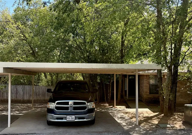 a car parked in front of a house