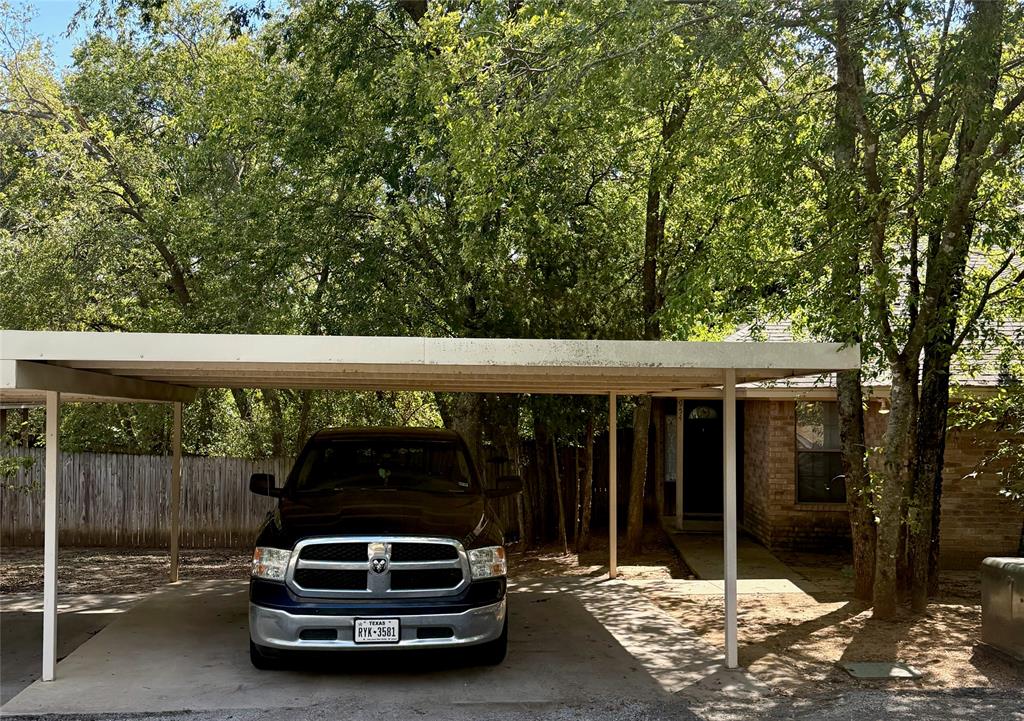 954 East 3rd Street Weatherford, TX 76086 - Photo 16 of 17 a car parked in front of a house
