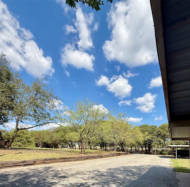 954 East 3rd Street Weatherford, TX 76086 - Photo 17 of 17 a view of a lake with a house