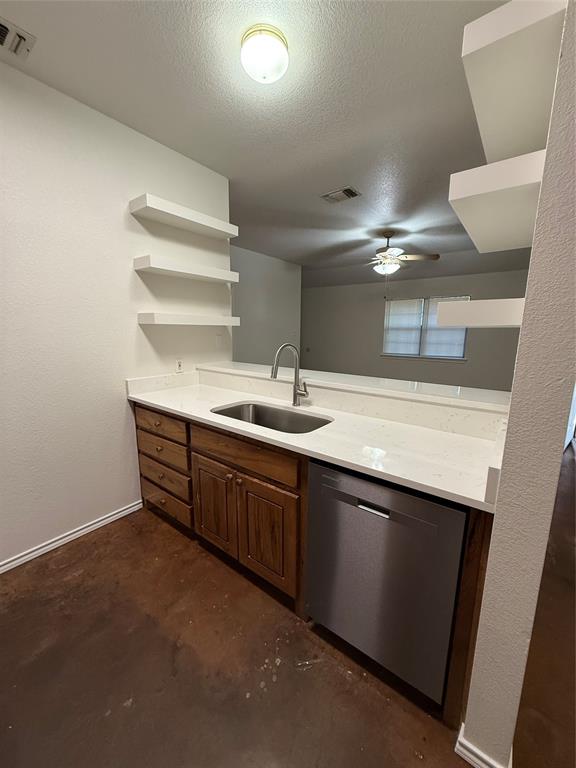 954 East 3rd Street Weatherford, TX 76086 - Photo 5 of 17 a bathroom with a sink and a mirror