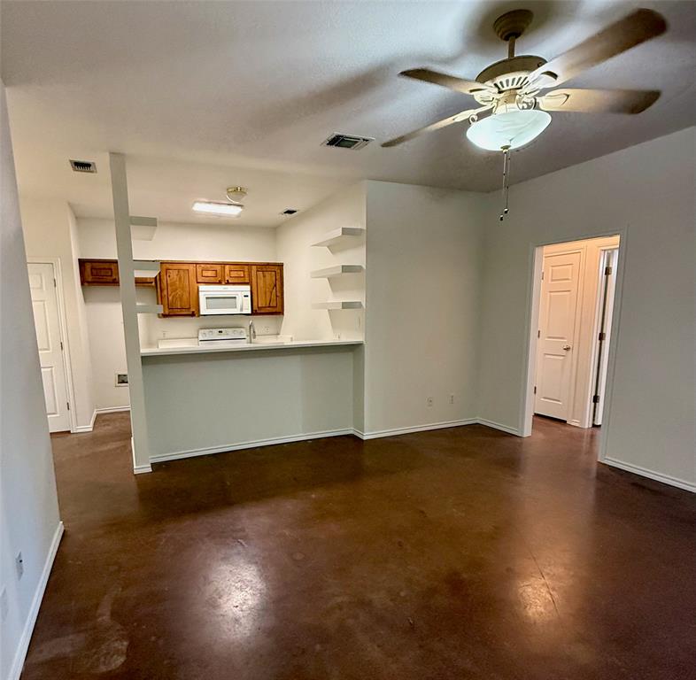 954 East 3rd Street Weatherford, TX 76086 - Photo 6 of 17 a view of a kitchen with a sink and cabinet area