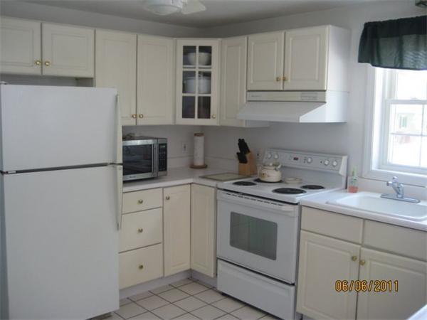 8 Browns Brook Road Webster, MA 01570 - Photo 1 of 20 a kitchen with cabinets appliances a sink and a window