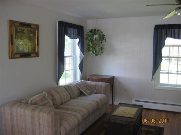 8 Browns Brook Road Webster, MA 01570 - Photo 5 of 20 a living room with furniture and a window