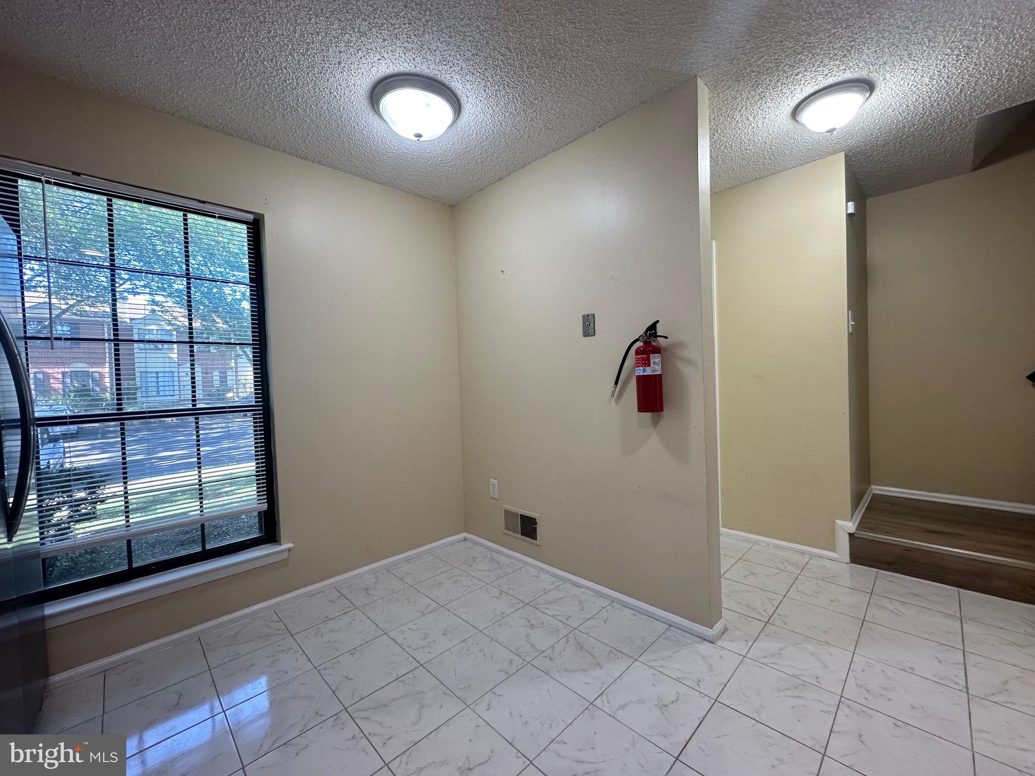 6 Wosniak Court Lawrence Township, NJ 08648 - Photo 5 of 20 an empty room with windows