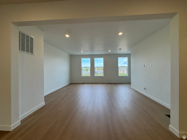1876 West 1575th North, Unit 237 Layton, UT 84041 - Photo 10 of 20 Spare room with dark wood-style floors and recessed lighting