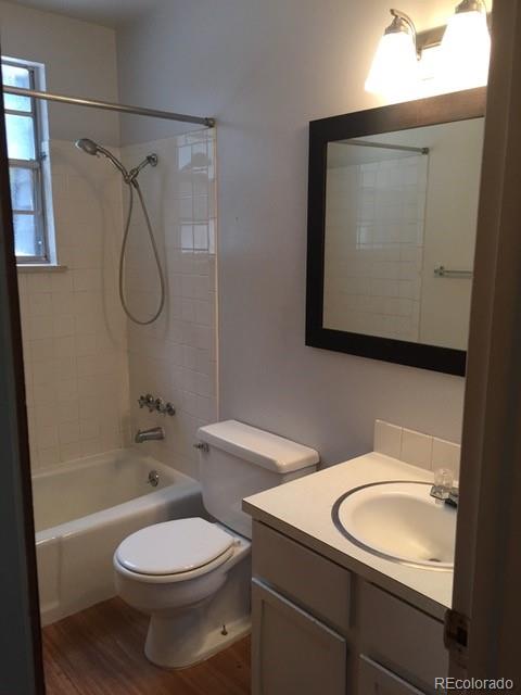 2703 Stanford Road Fort Collins, CO 80525 - Photo 21 of 30 a bathroom with a sink a toilet and shower