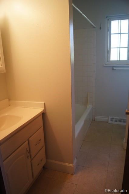 2703 Stanford Road Fort Collins, CO 80525 - Photo 29 of 30 a bathroom with a sink and vanity