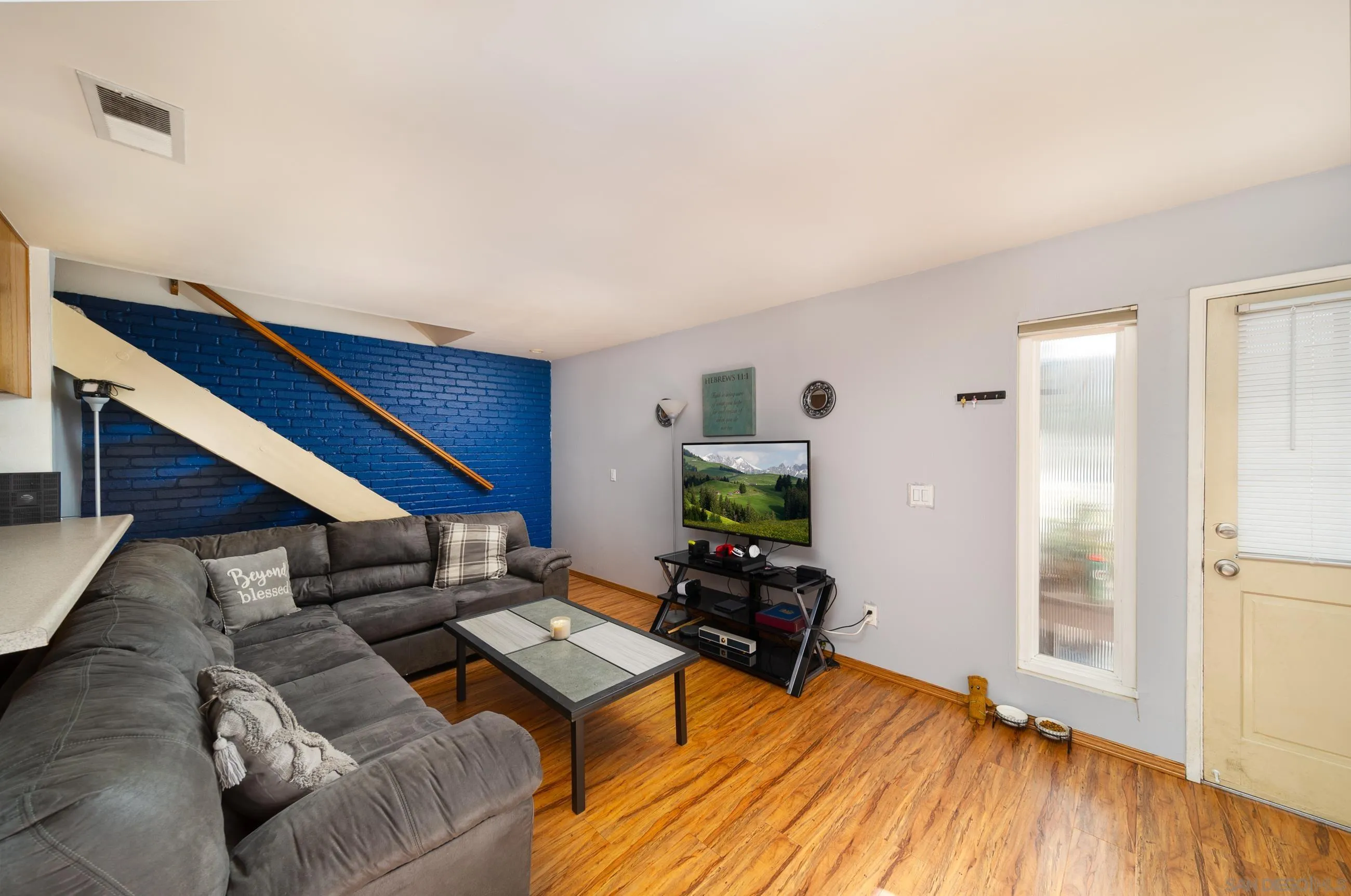 9920 Mission Vega Road, Unit 2 Santee, CA 92071 - Photo 14 of 21 a living room with furniture and wooden floor