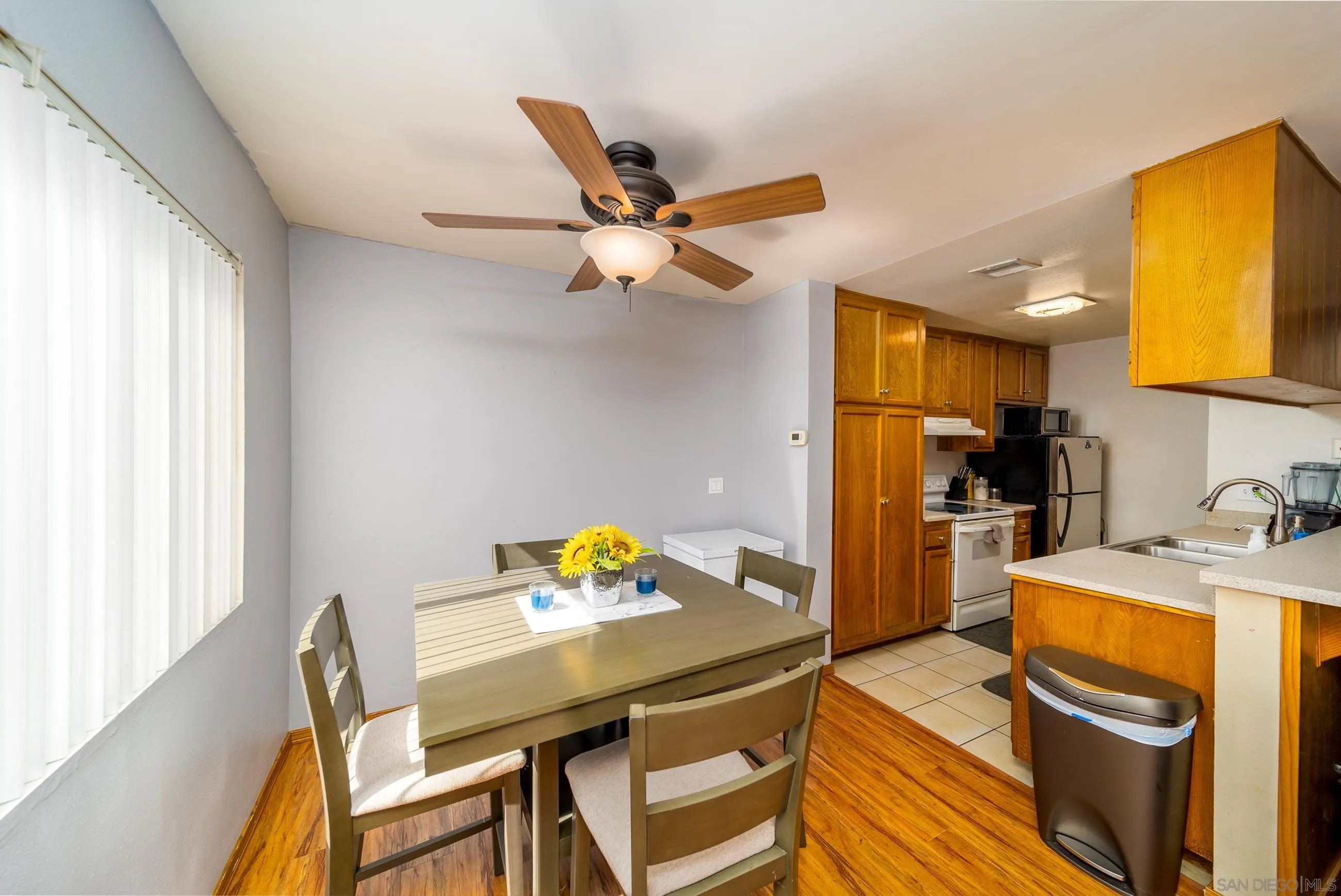 9920 Mission Vega Road, Unit 2 Santee, CA 92071 - Photo 19 of 21 a view of a dining room with furniture and a window