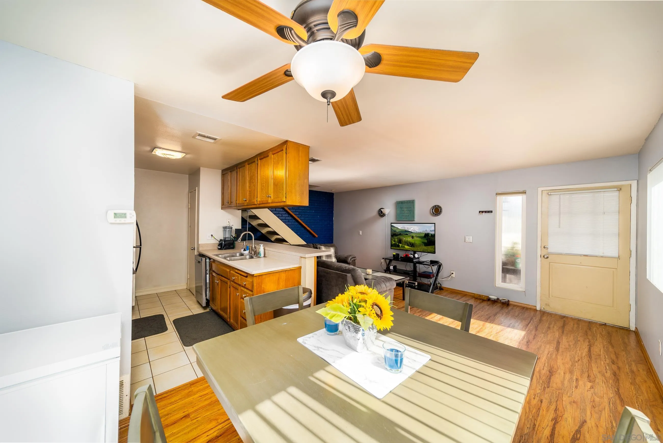 9920 Mission Vega Road, Unit 2 Santee, CA 92071 - Photo 20 of 21 a living room with kitchen furniture and a wooden floor