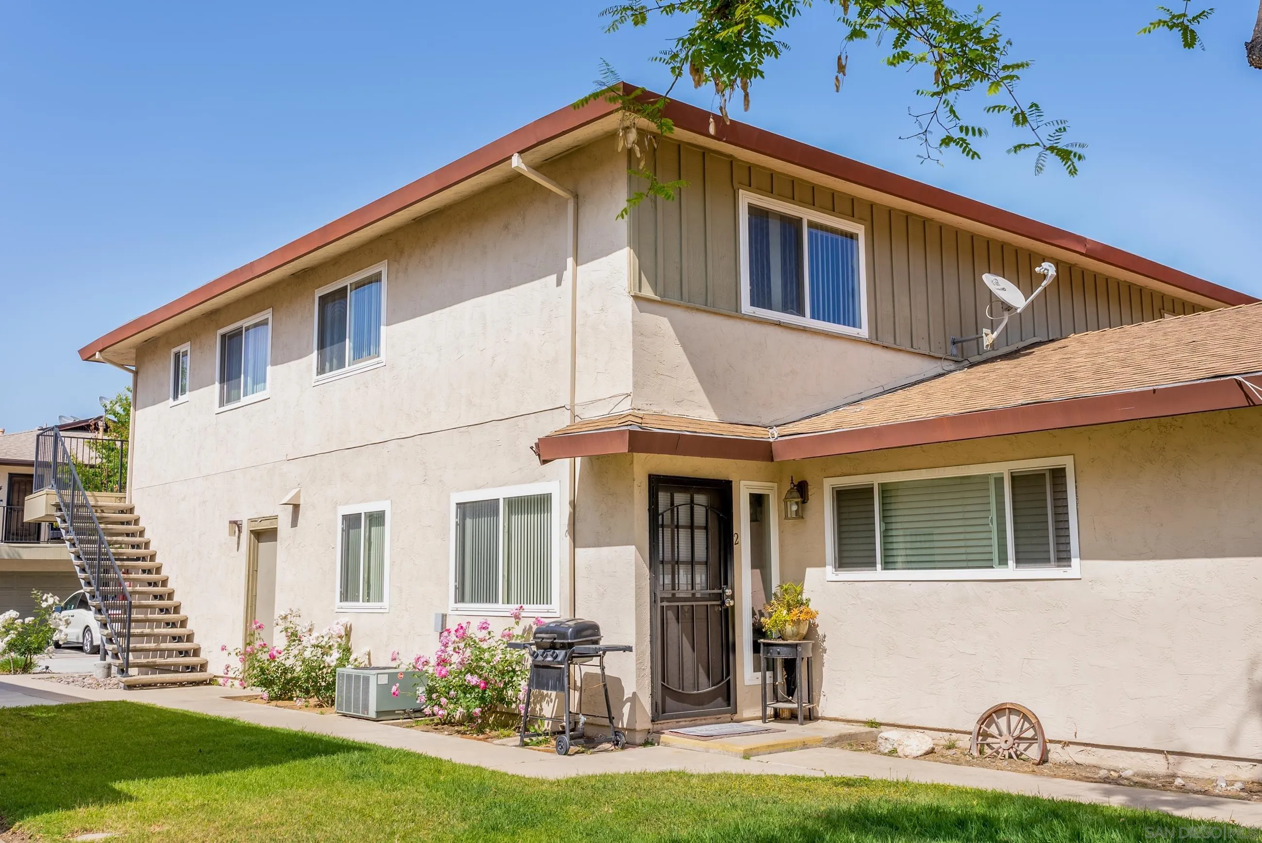 9920 Mission Vega Road, Unit 2 Santee, CA 92071 - Photo 2 of 21 a front view of a house with garden