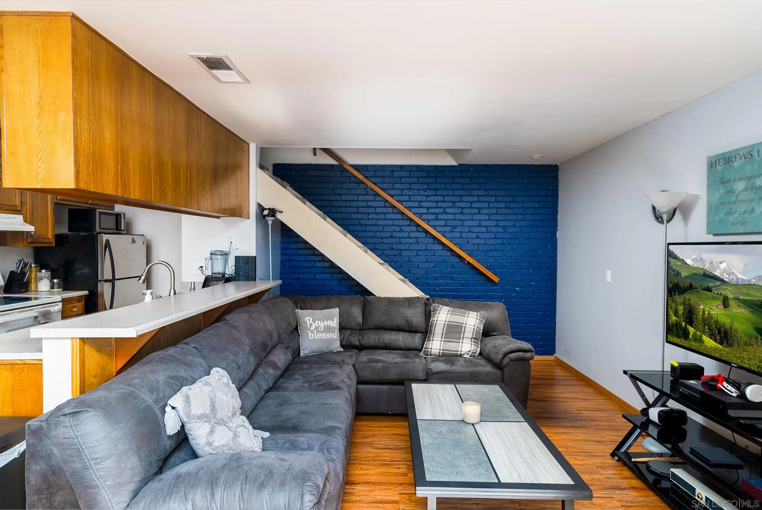 9920 Mission Vega Road, Unit 2 Santee, CA 92071 - Photo 21 of 21 a view of a kitchen with furniture and a flat screen tv