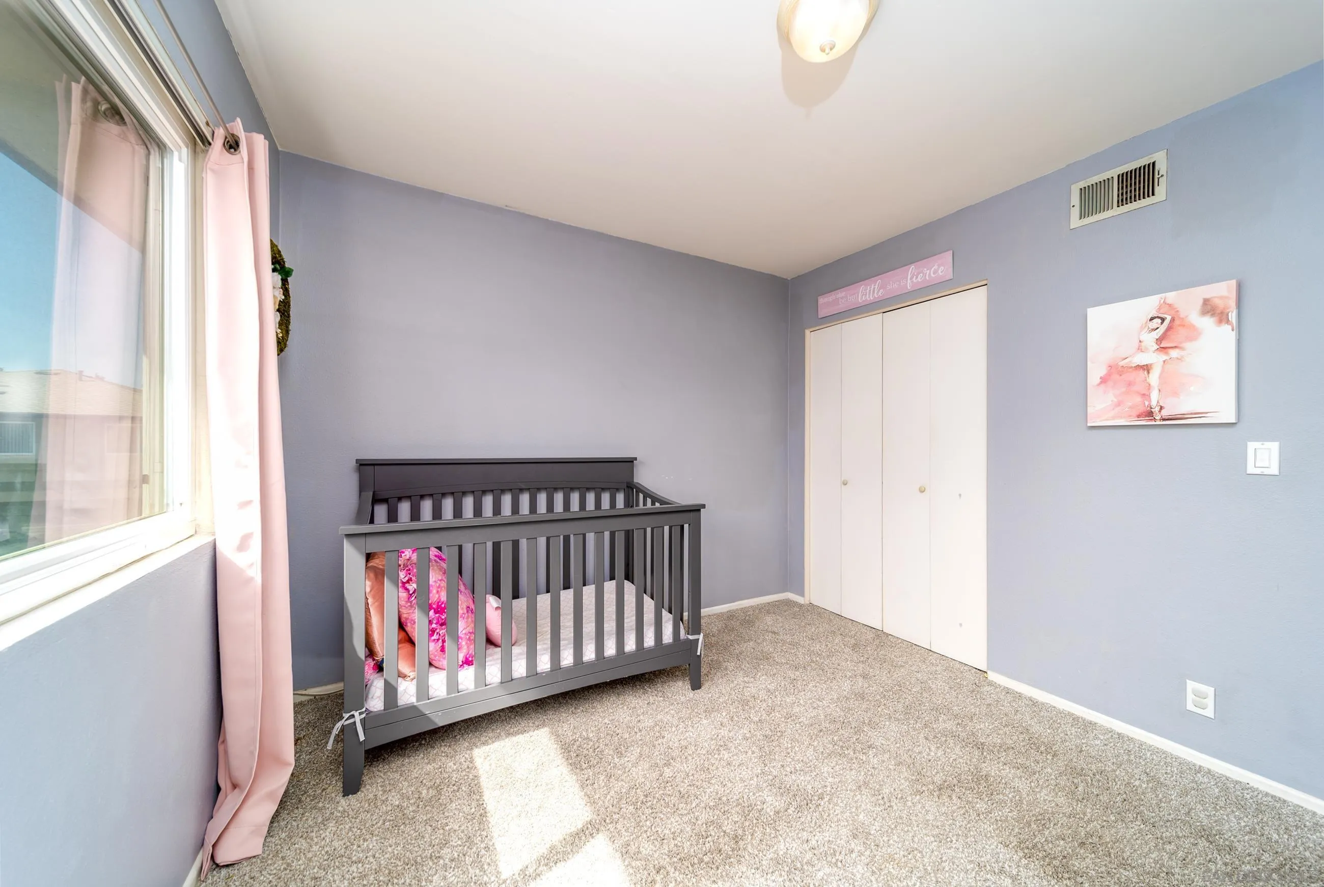 9920 Mission Vega Road, Unit 2 Santee, CA 92071 - Photo 8 of 21 a bed room with a bed and a window