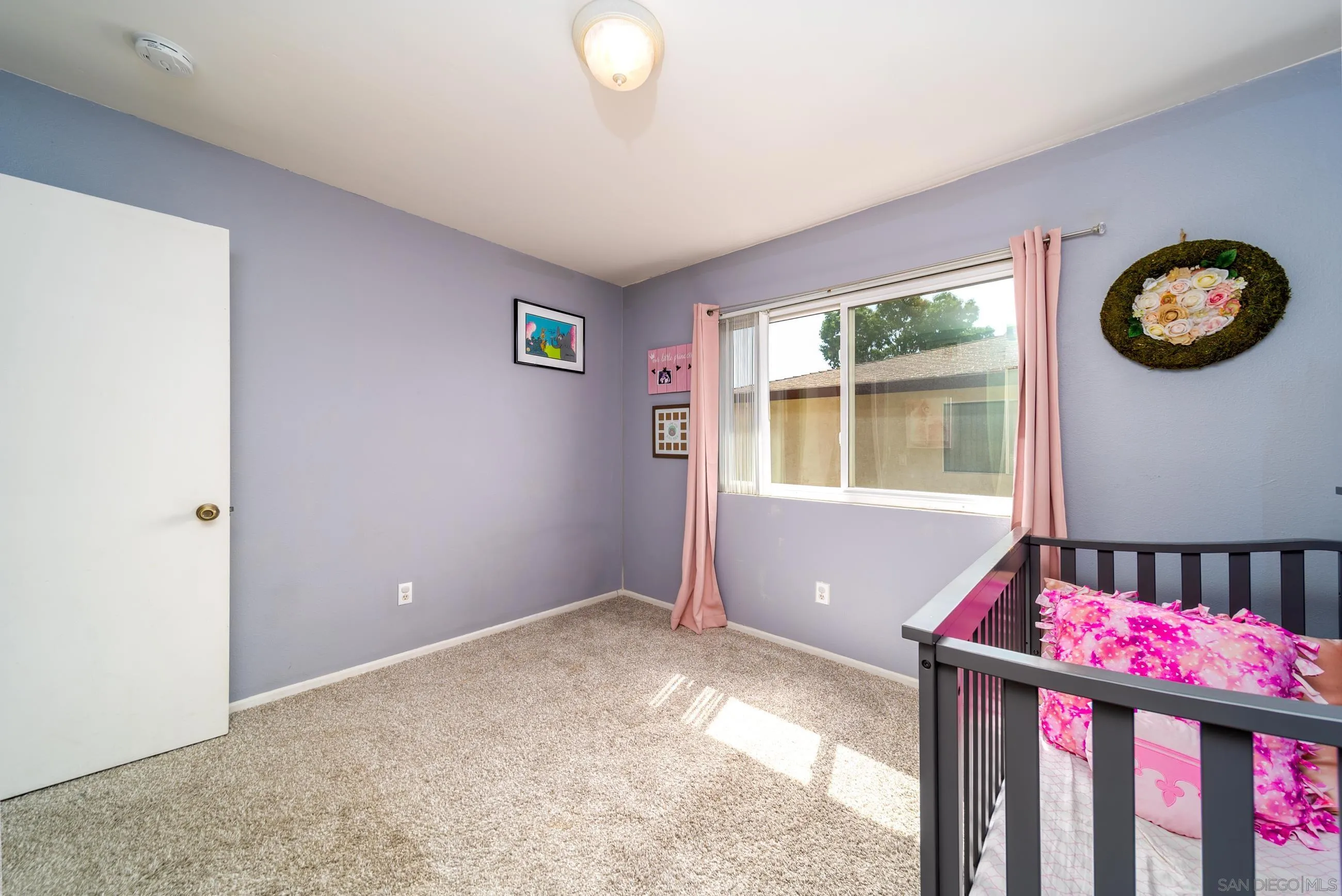 9920 Mission Vega Road, Unit 2 Santee, CA 92071 - Photo 9 of 21 a view of an empty room with a window