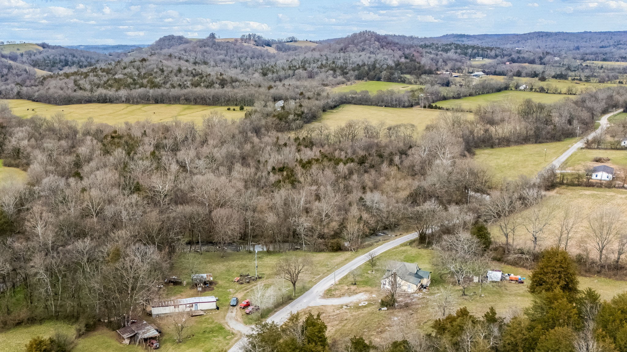 0 Duck Branch Road Fayetteville, TN 37334 - Photo 6 of 9 a view of a lake with a mountain