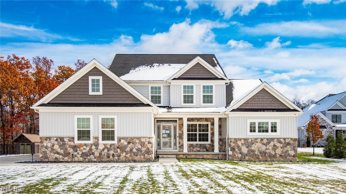 4641 Foote Road Medina, OH 44256 - Photo 1 of 46 Craftsman-style house featuring a porch and stone siding