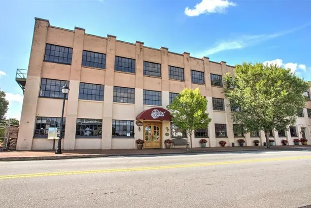 front view of a building with a street