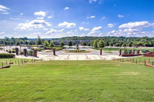 a view of a swimming pool with a table and chairs