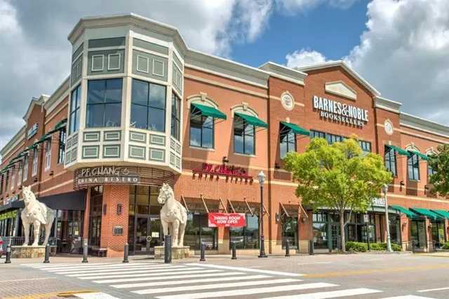 a view of a building on a street