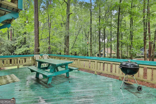 a view of a two chairs in the deck